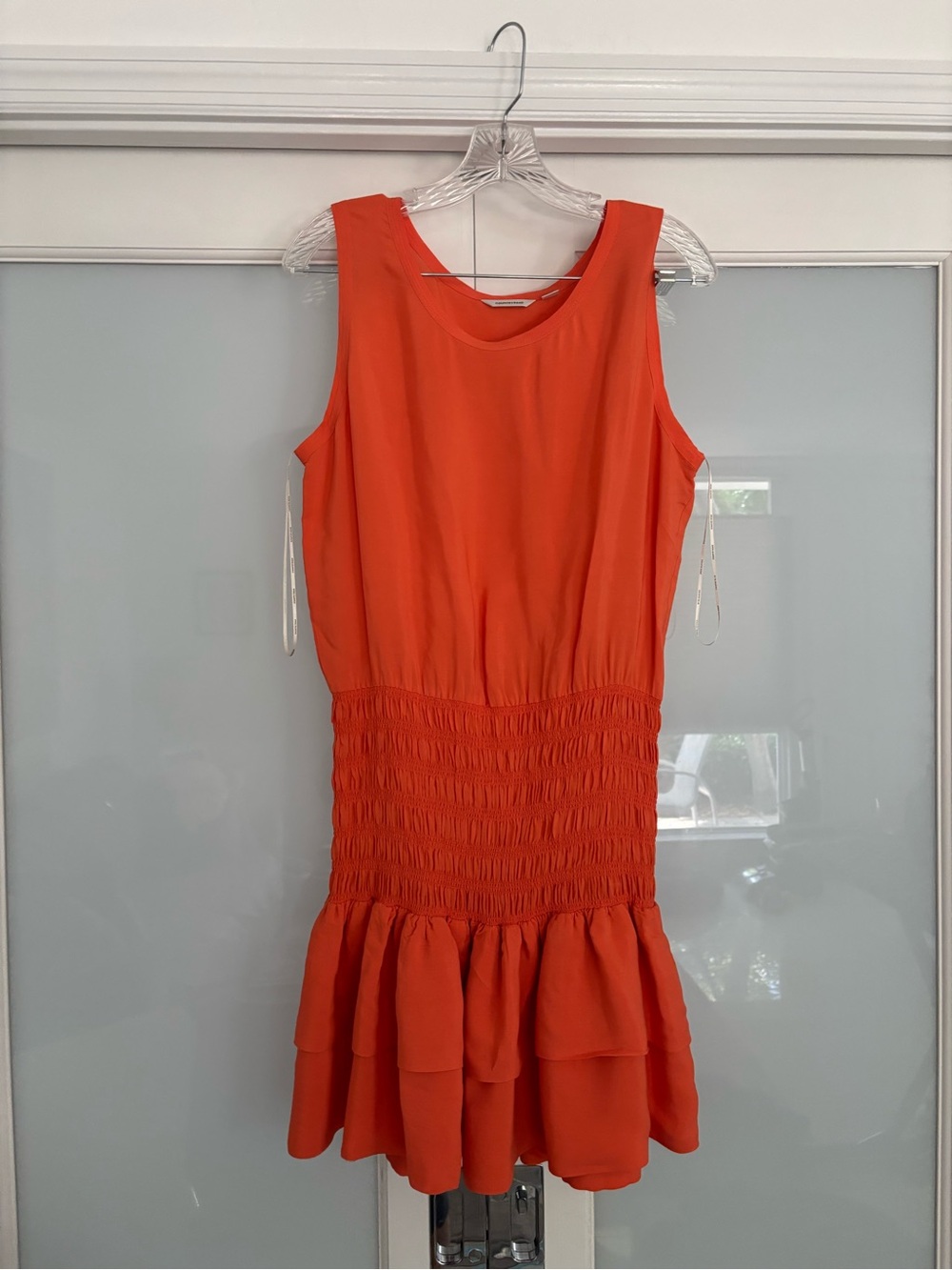 Country Road Orange Sleeveless Smocked Waist Ruffle Dress